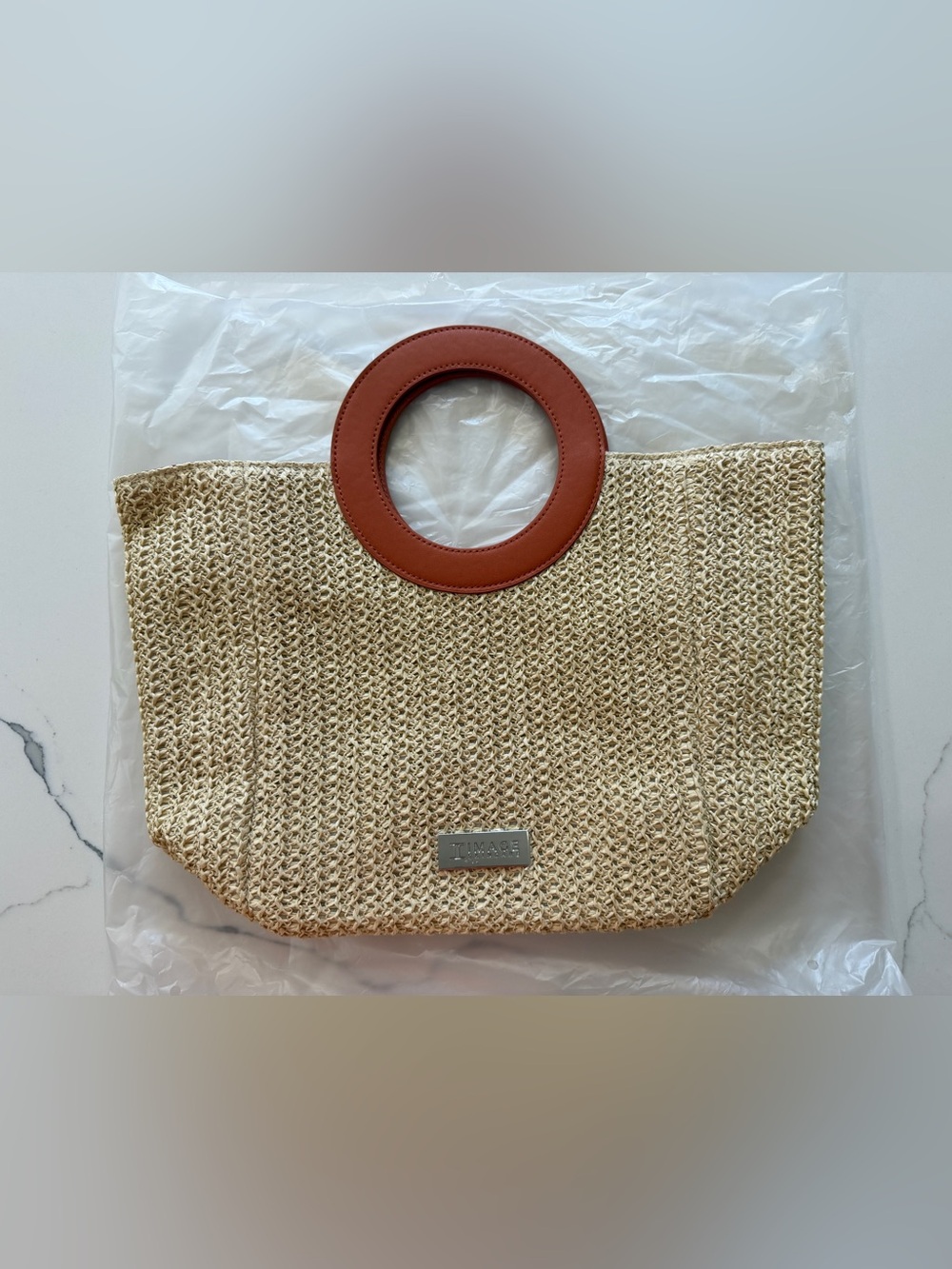 Woven Straw Tote with Tan Circular Leather Handles
